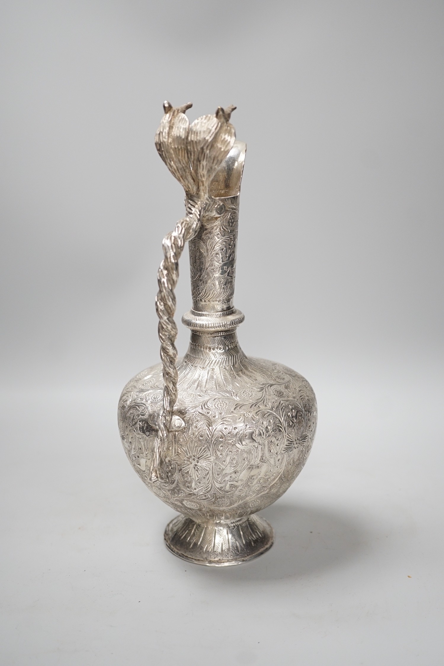 A decorative Indian silver plated cobra ewer. 29.5cm